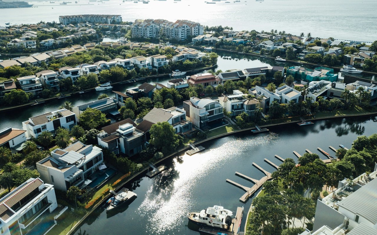 Waterfront homes line canals with private docks and boats.