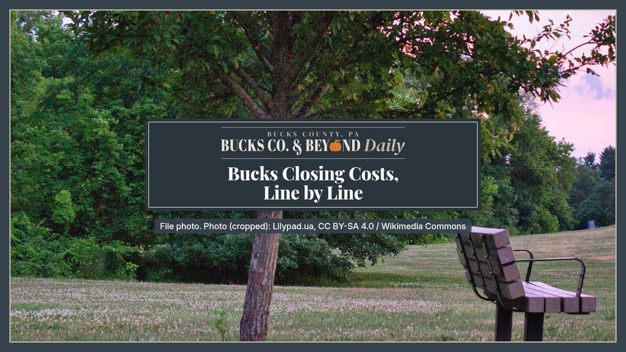 Bucks Co. & Beyond Daily: Bucks closing costs, line by line. A wooden bench under a leafy shade tree on a grassy park lawn in the Cobalt Ridge section of Levittown under a pink evening sky.