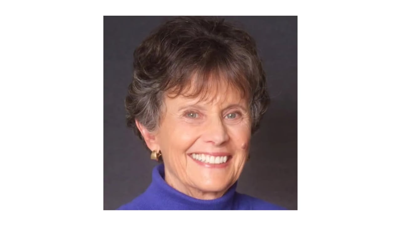 Rosemary Yandell smiling in a blue top.