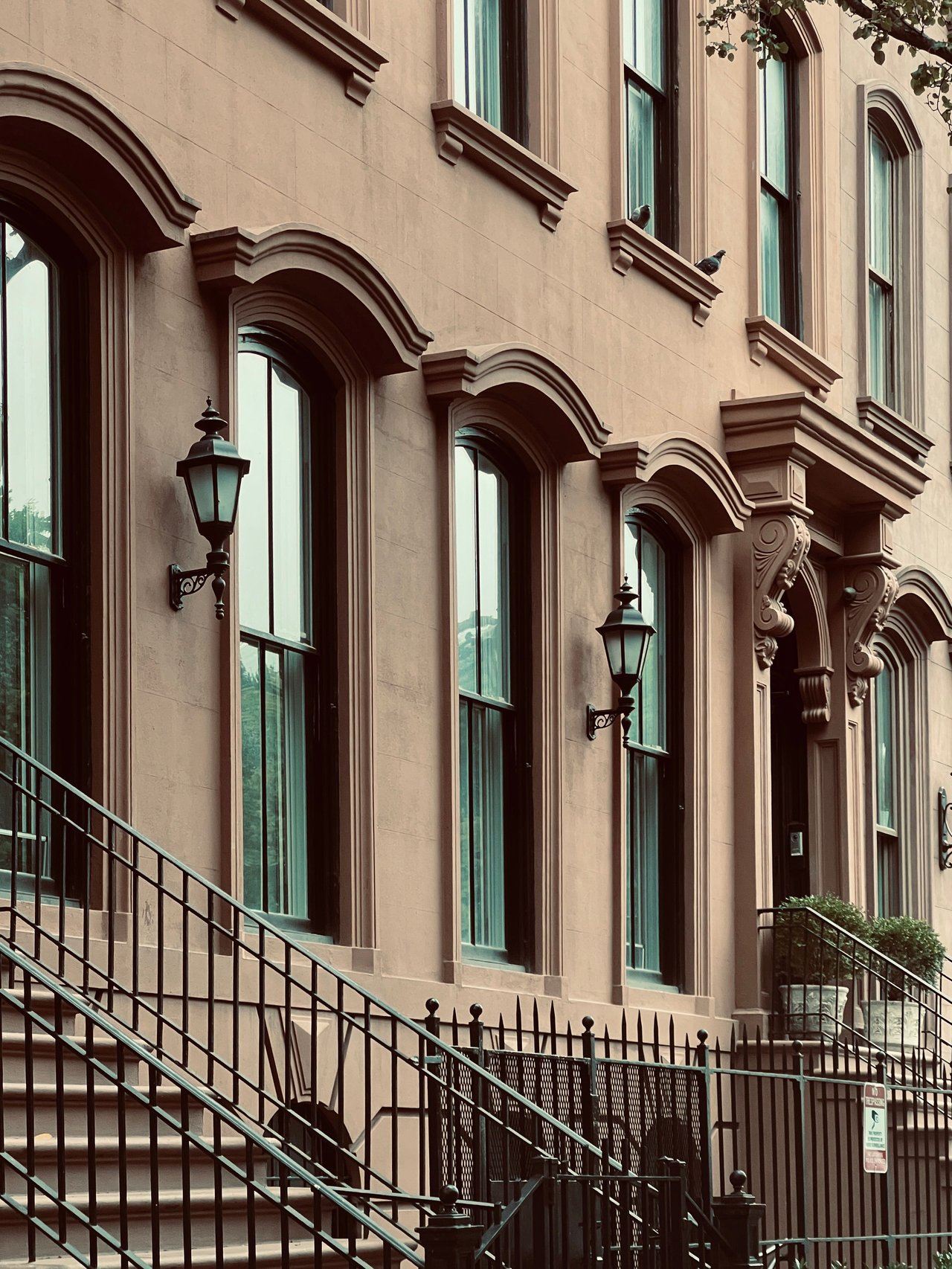 Historic brownstones, elegant townhouses, tree-lined blocks, and boutique condominiums along Sackett Street in Carroll Gardens, Brooklyn.