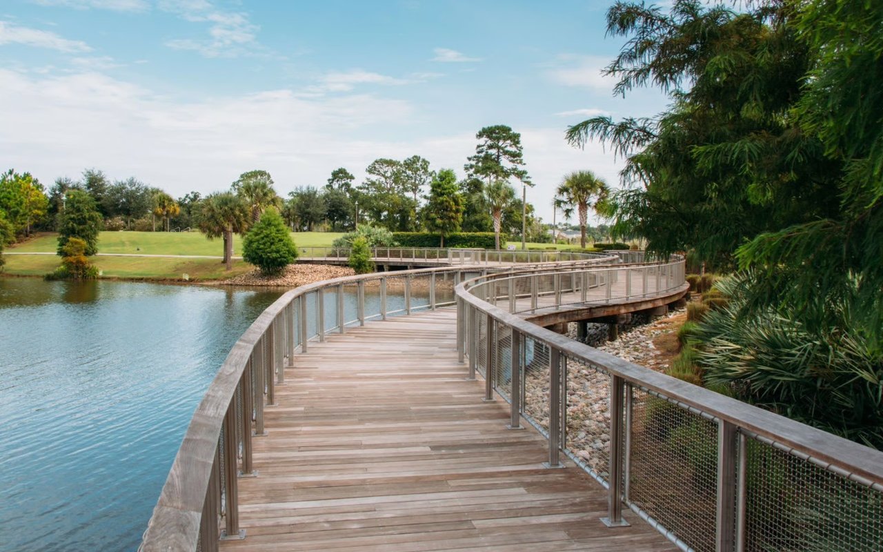 Peaceful view of Oviedo Florida featuring suburban homes, tree-lined streets, and a family-friendly community atmosphere