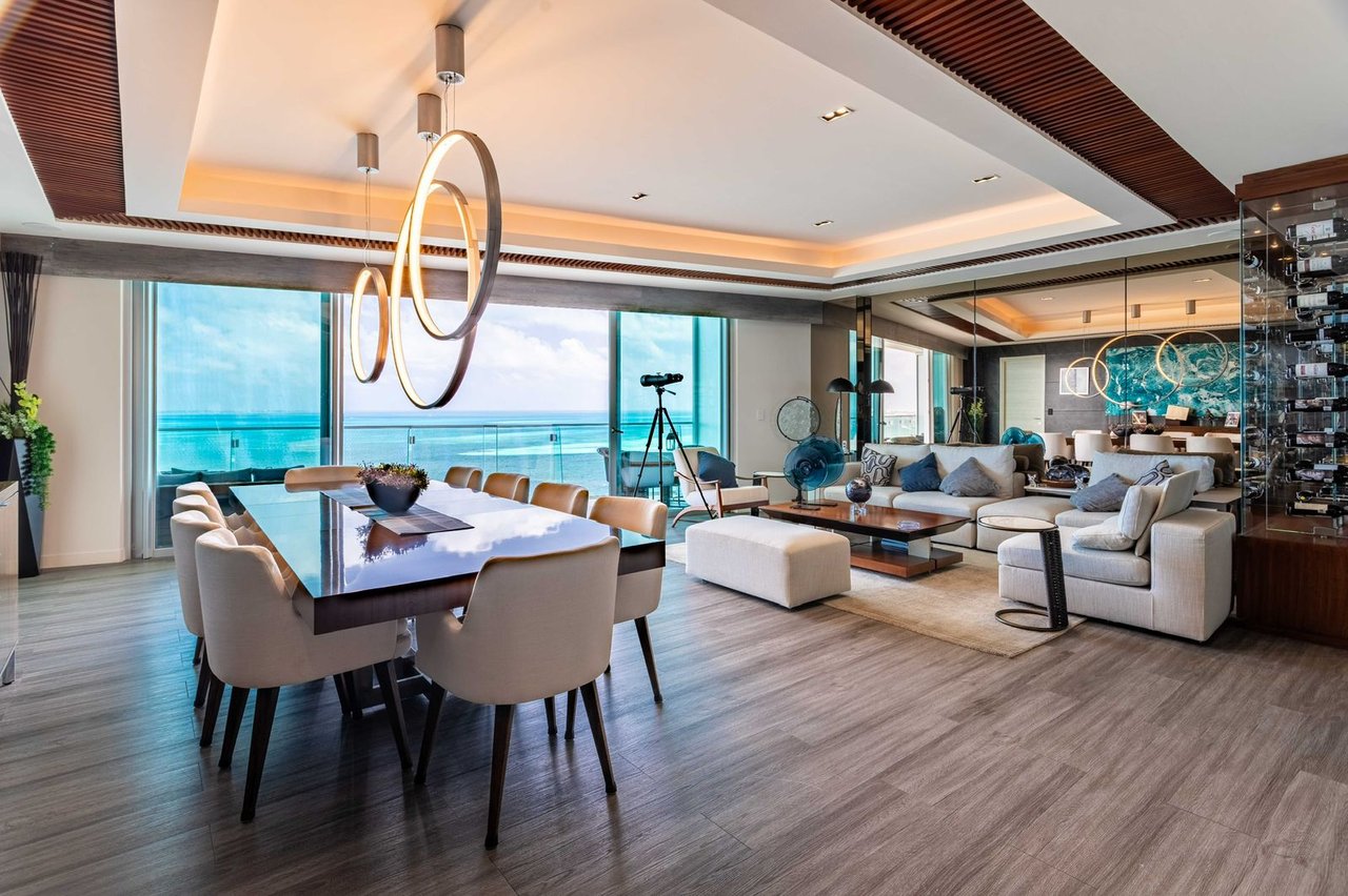 LUXURIOUS and STUNNING apartment featuring OCEAN VIEWS from the living room, primary bedroom, and terrace, with BEACHFRONT access in Cancun's most upscale area