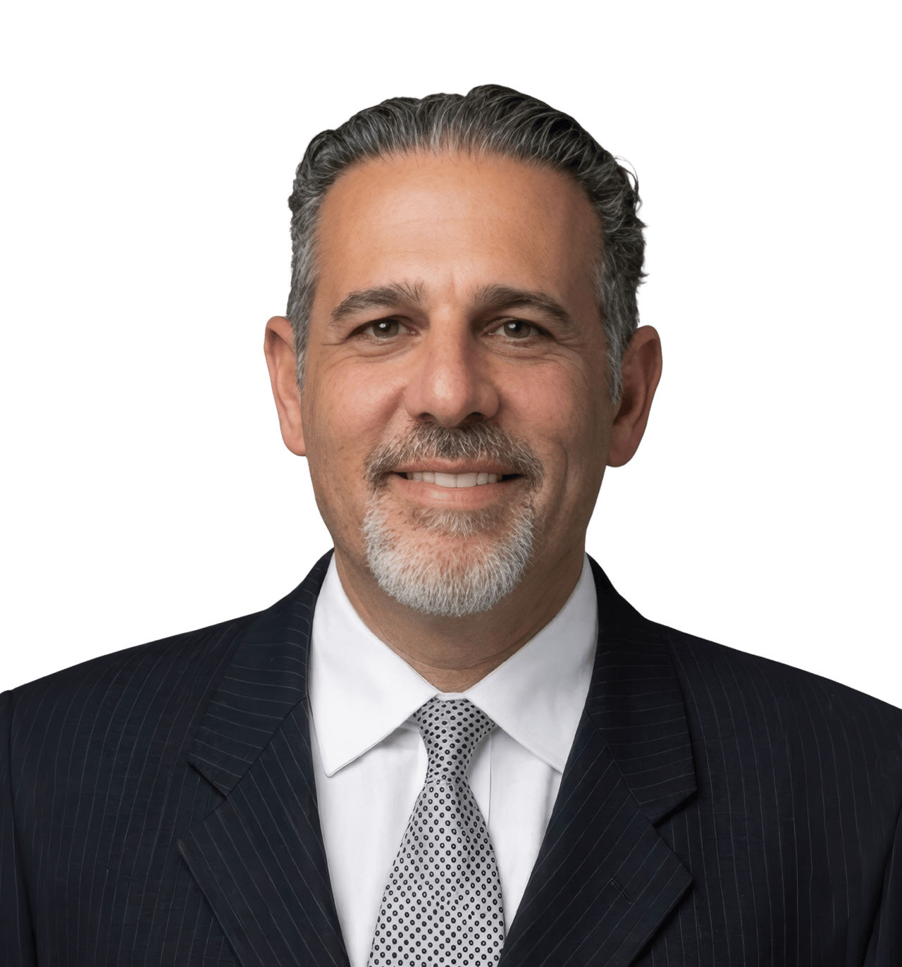 Arman Karakesisoglu in a dark pinstripe suit and patterned tie.