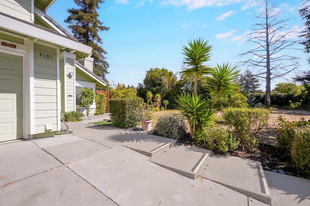 Home at 4101 Hanford St with a broad concrete walkway and landscaped front yard.