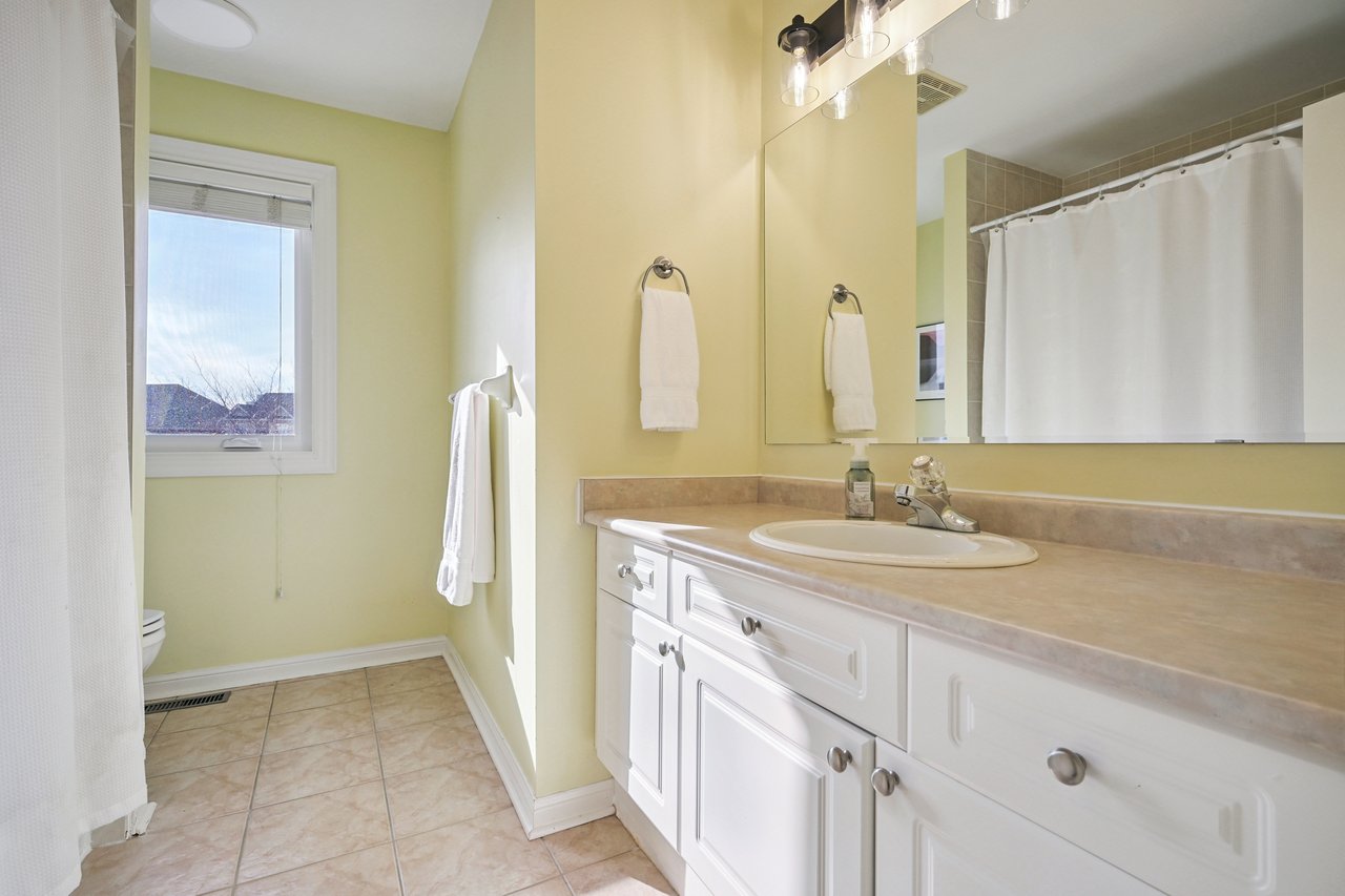 Sun-Filled Sophistication on a Rare Pie-Shaped Lot in West Oak Trails