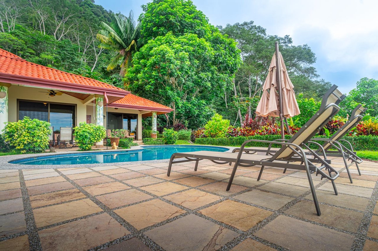 Ocean, jungle & mountain views on a meticulously landscaped 3-home family compound