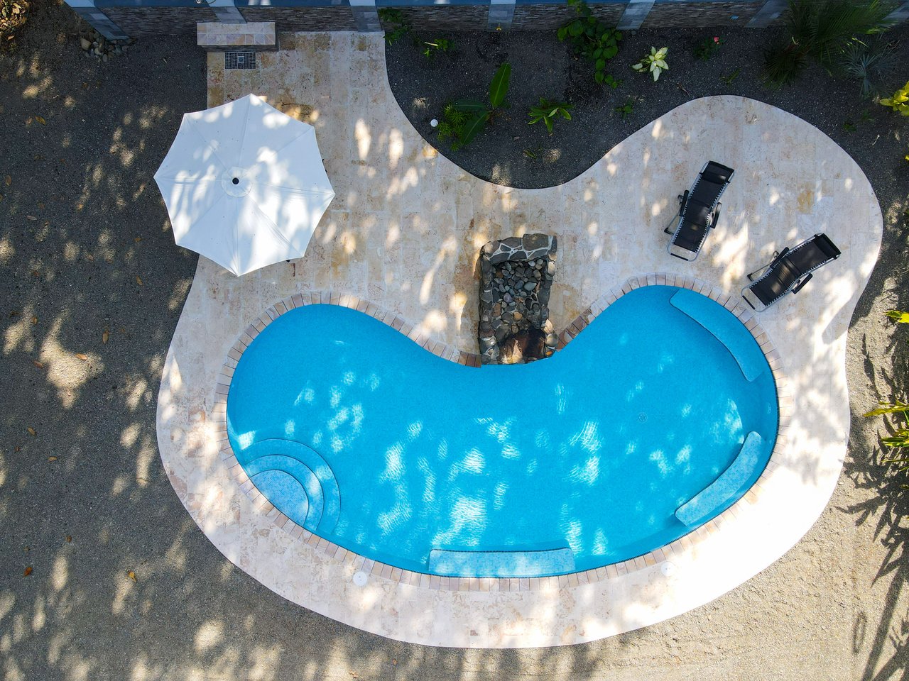 Beach estate with a main house, 3 rentals, and pool