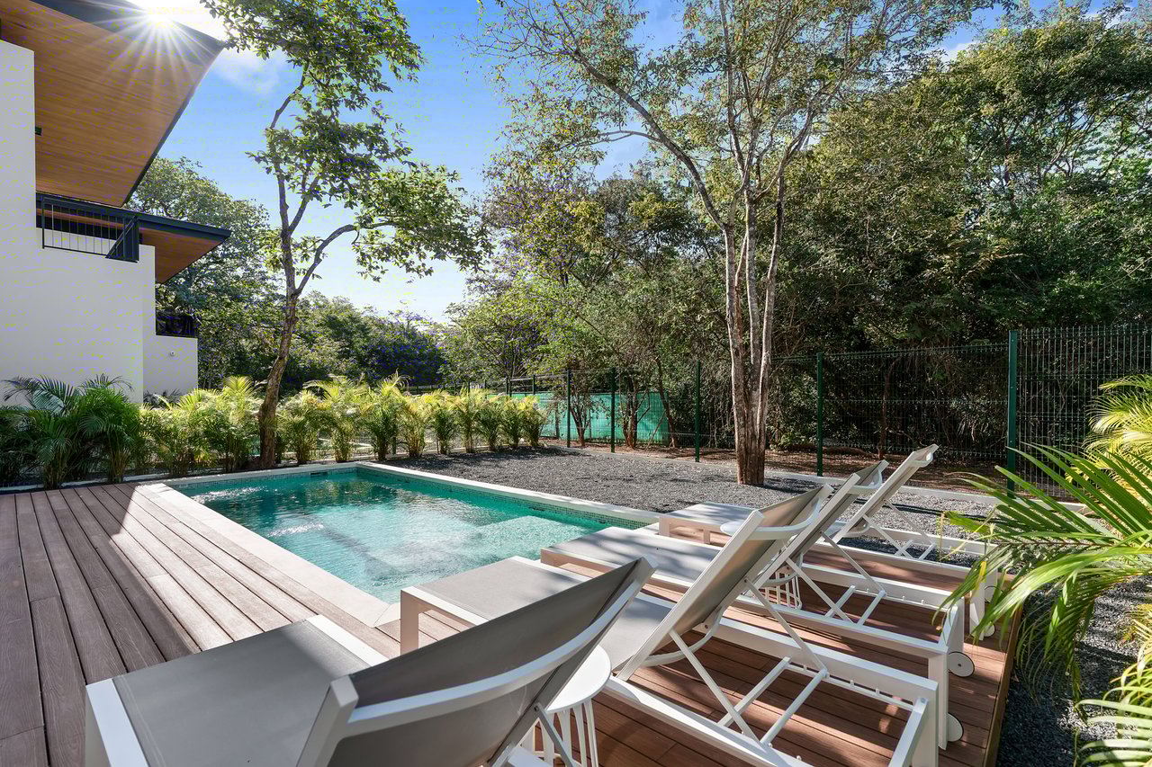 Villa Tropical Dawn | 4-Bedroom Modern Oasis in Bosques de Pinilla with Forest Views & Resort-Style Amenities