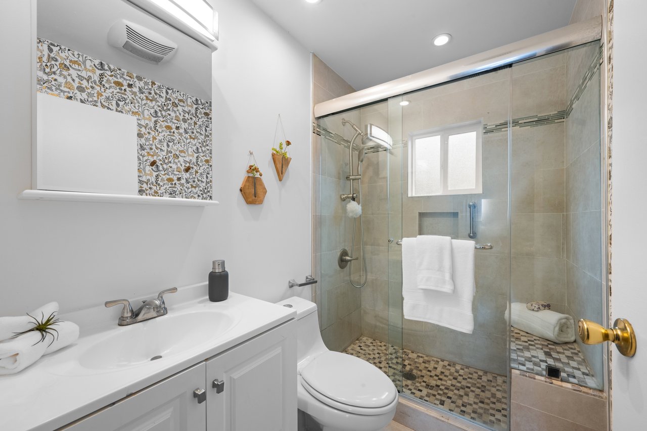 Enjoying the amenities in the upstairs bathroom at 1449 Innes Avenue in Bayview San Francisco