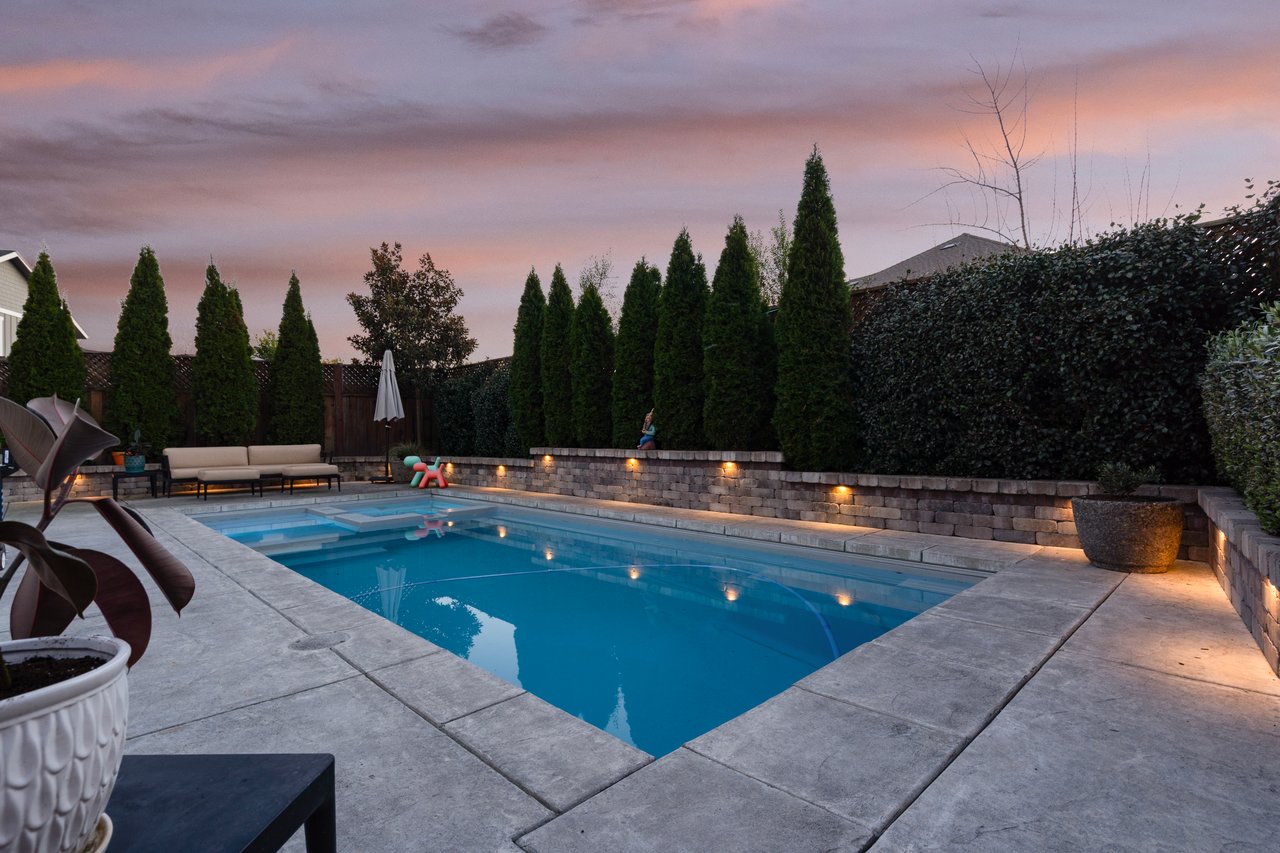 Pool and deck area with flexible shade and lounging space