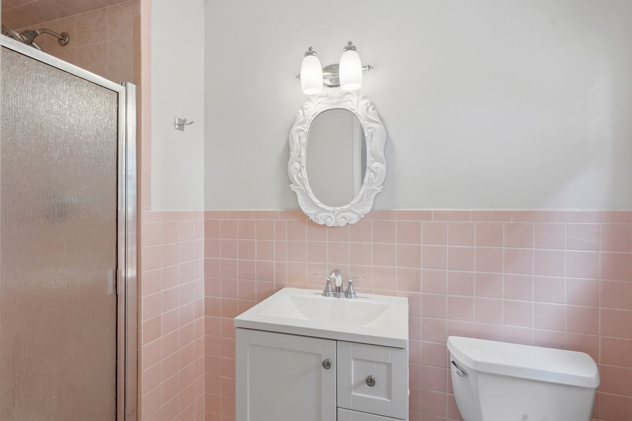 Featuring stand-in shower, sink and toilet