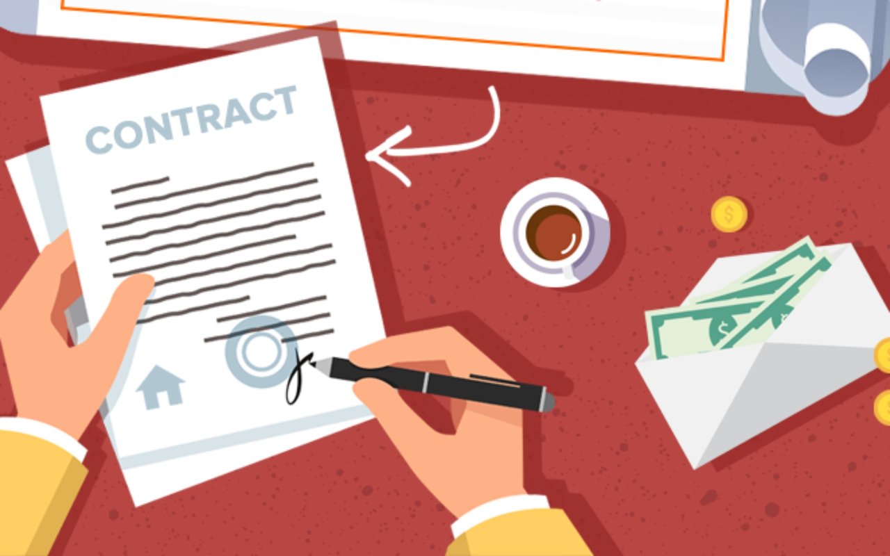 Real estate purchase contract being signed beside a coffee cup and an envelope of cash.
