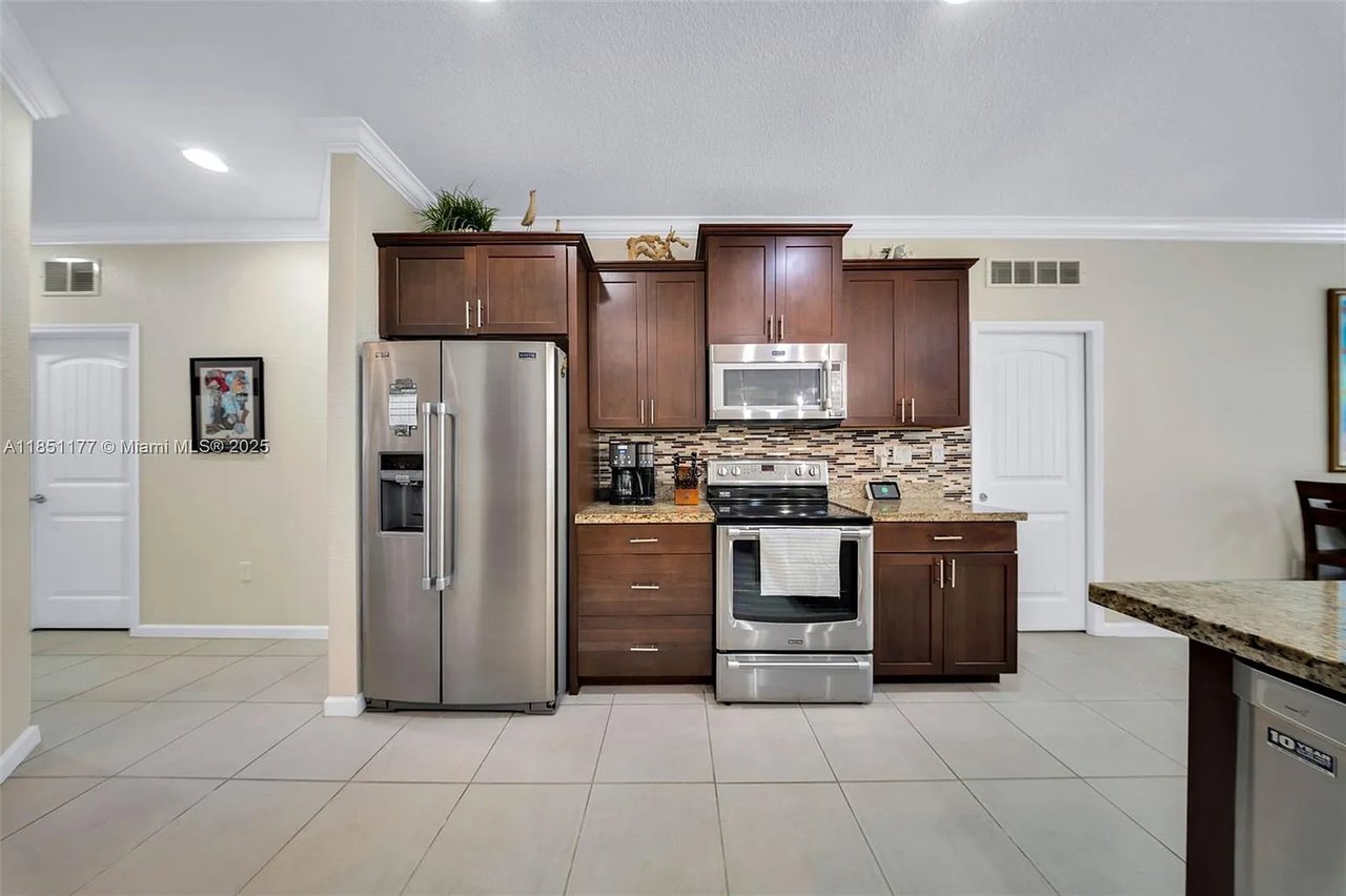 12801-sw-223-street-miami-pool-fl-home-sold-kitchen