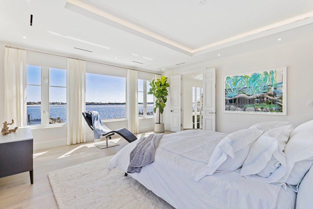 primary bedroom faces intracoastal blue water views and private dock