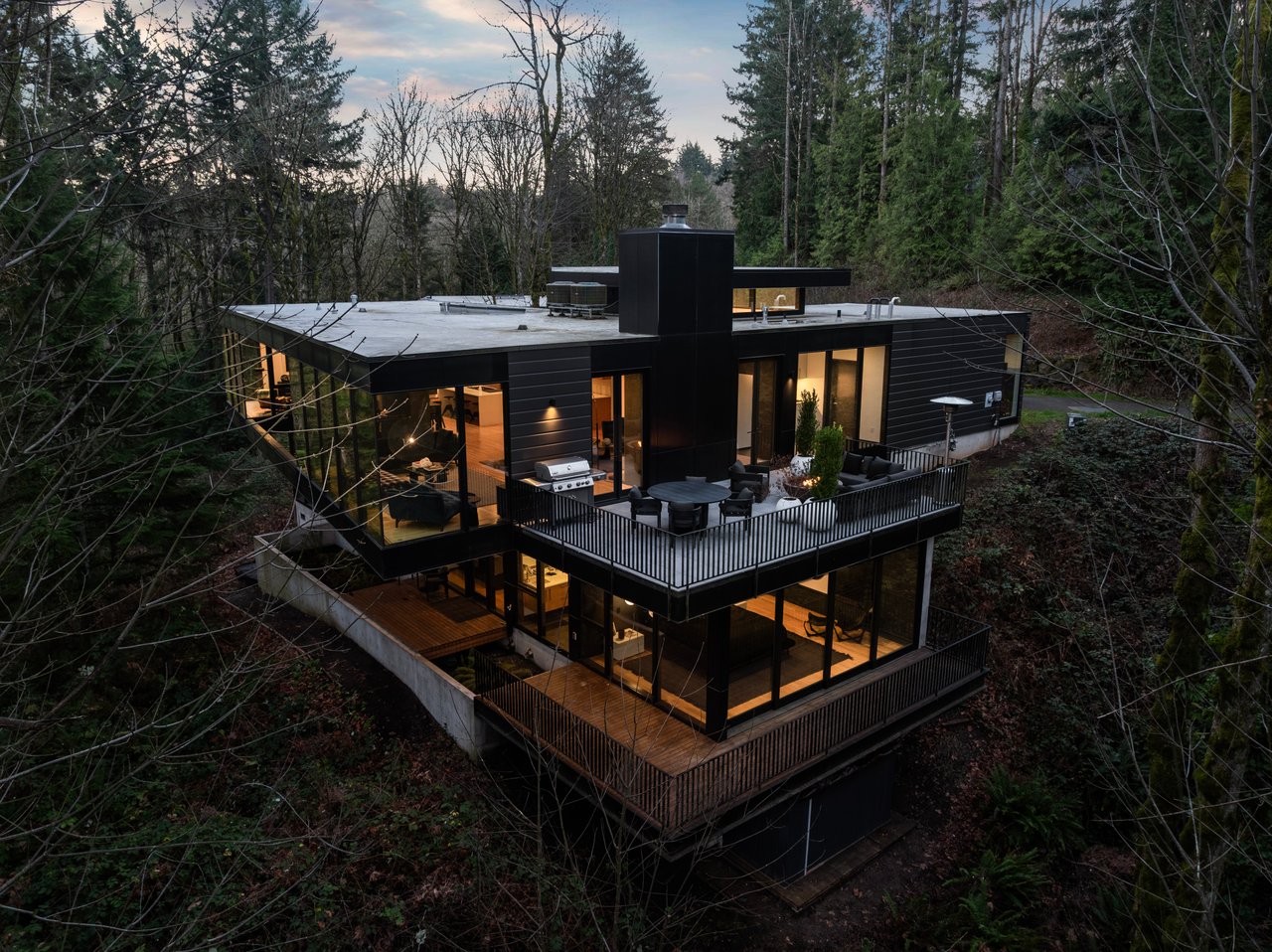 2 steel-and-glass luxury Portland homes among the trees are for sale at $3.3M+