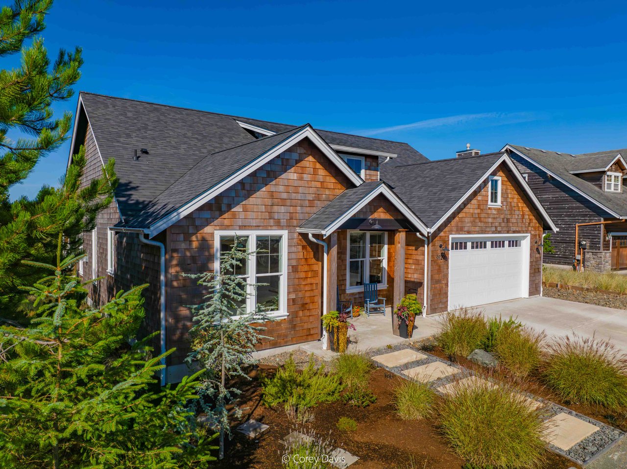 Exterior view of the sold custom home at 9920 Shore Pine Ln in Manzanita Oregon
