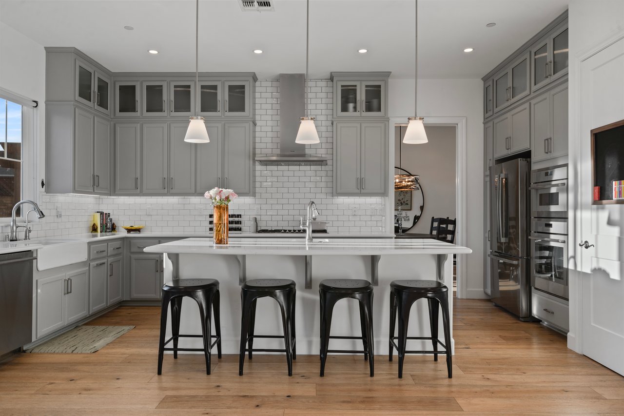Dining area in a Craftsman-style home with Mediterranean oak flooring