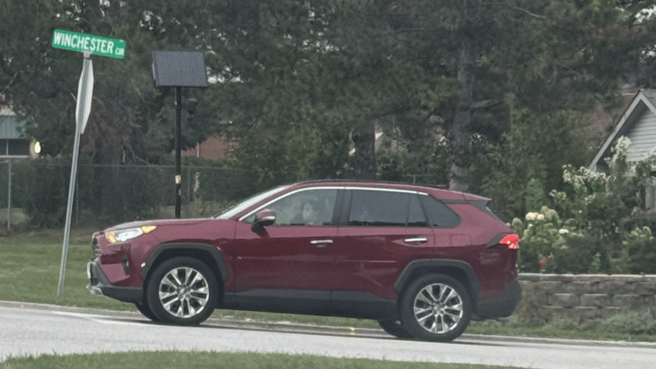 Solar-powered Flock license plate reader camera installed at the entrance of Winchester Circle subdivision in Warrenville, DuPage County, Illinois.