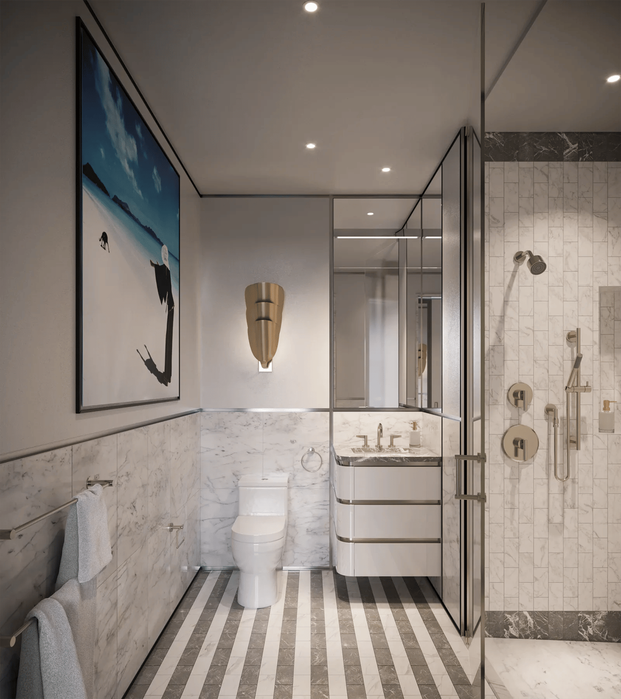 Marble bathroom with a glass shower, curved vanity, and striped stone floor.