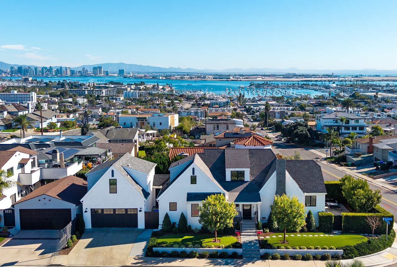 San Diego skyline and harbor view from Point Loma overlooking coastal homes