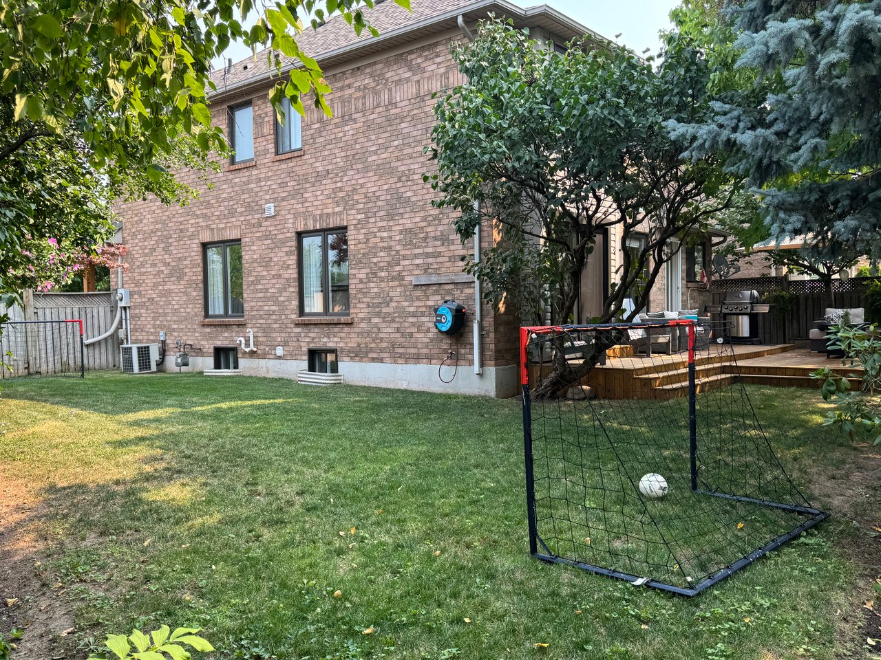 Sun-Filled Sophistication on a Rare Pie-Shaped Lot in West Oak Trails