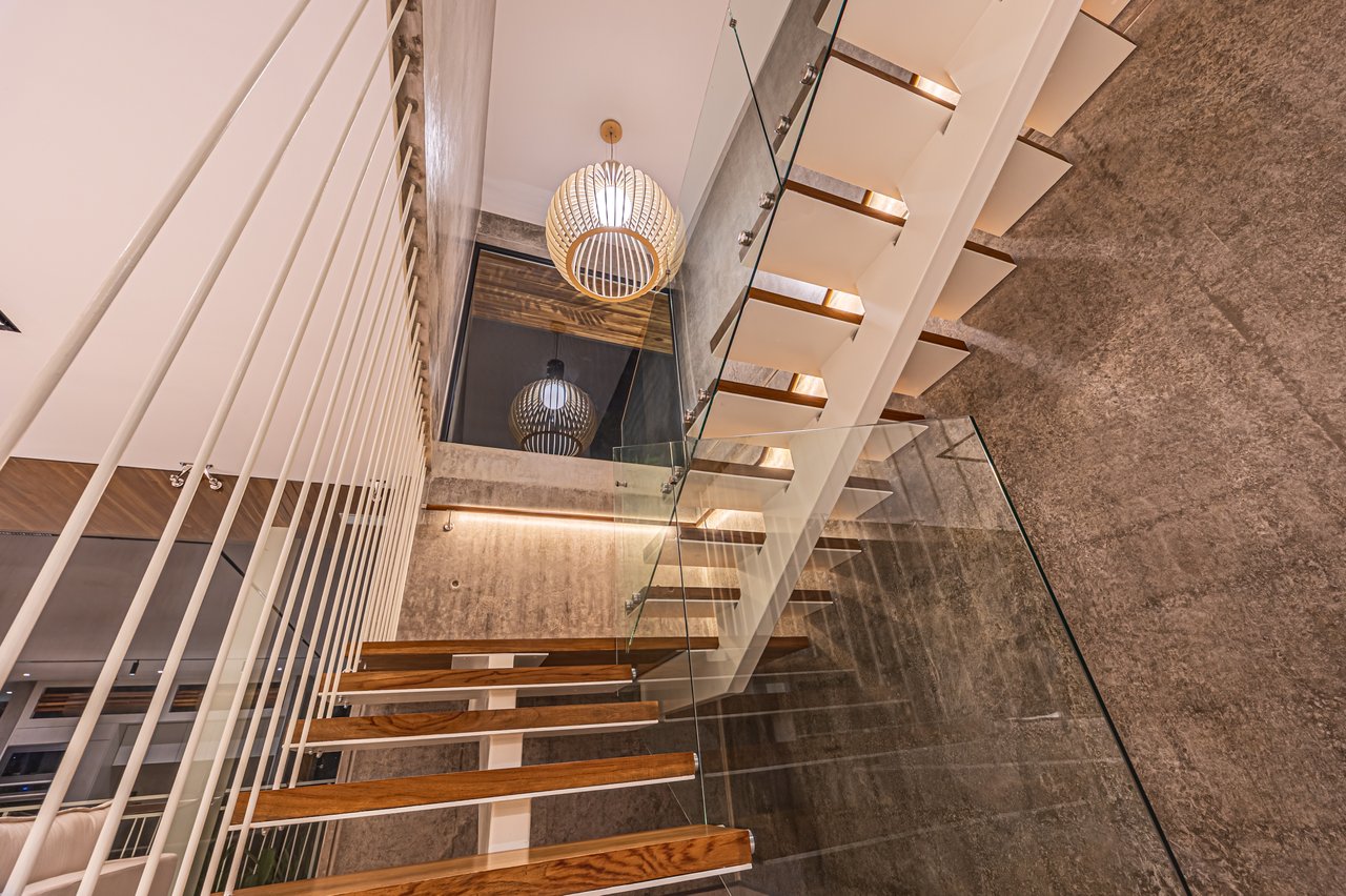 New contemporary tropical villa boasts with a movie theater and views of the iconic whale’s tail