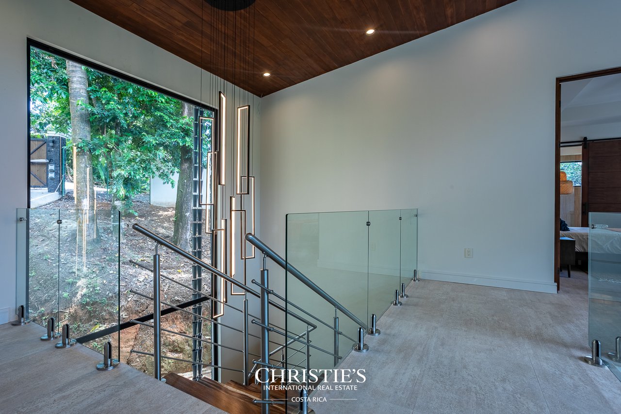 Modern Tropical Ocean & Mountain View Home