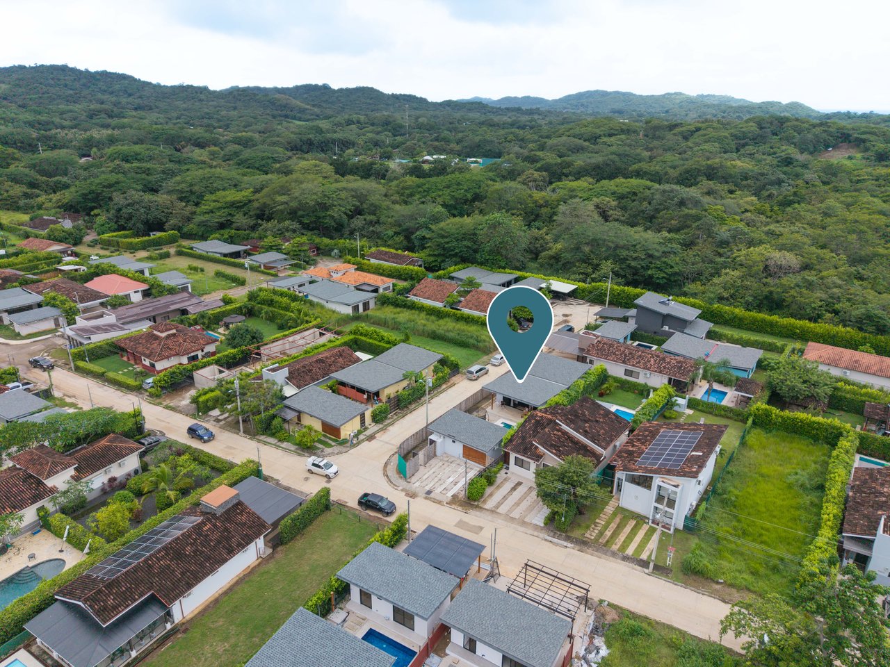 Loma Verde #48 | Modern Corner-Lot Home Surrounded by Green Mountain Views