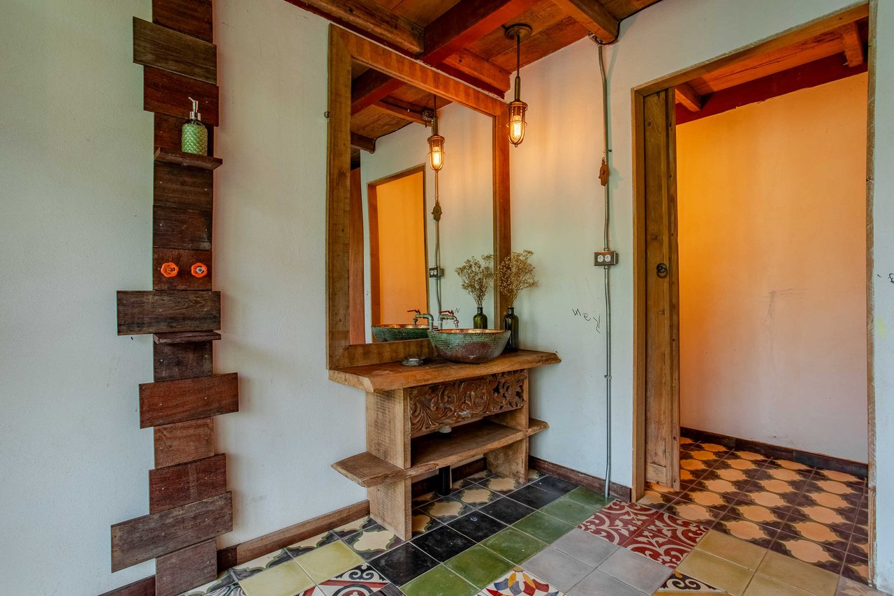 A Handcrafted Residence Immersed in Nature Above the Canopy Ocean View Architectural Home