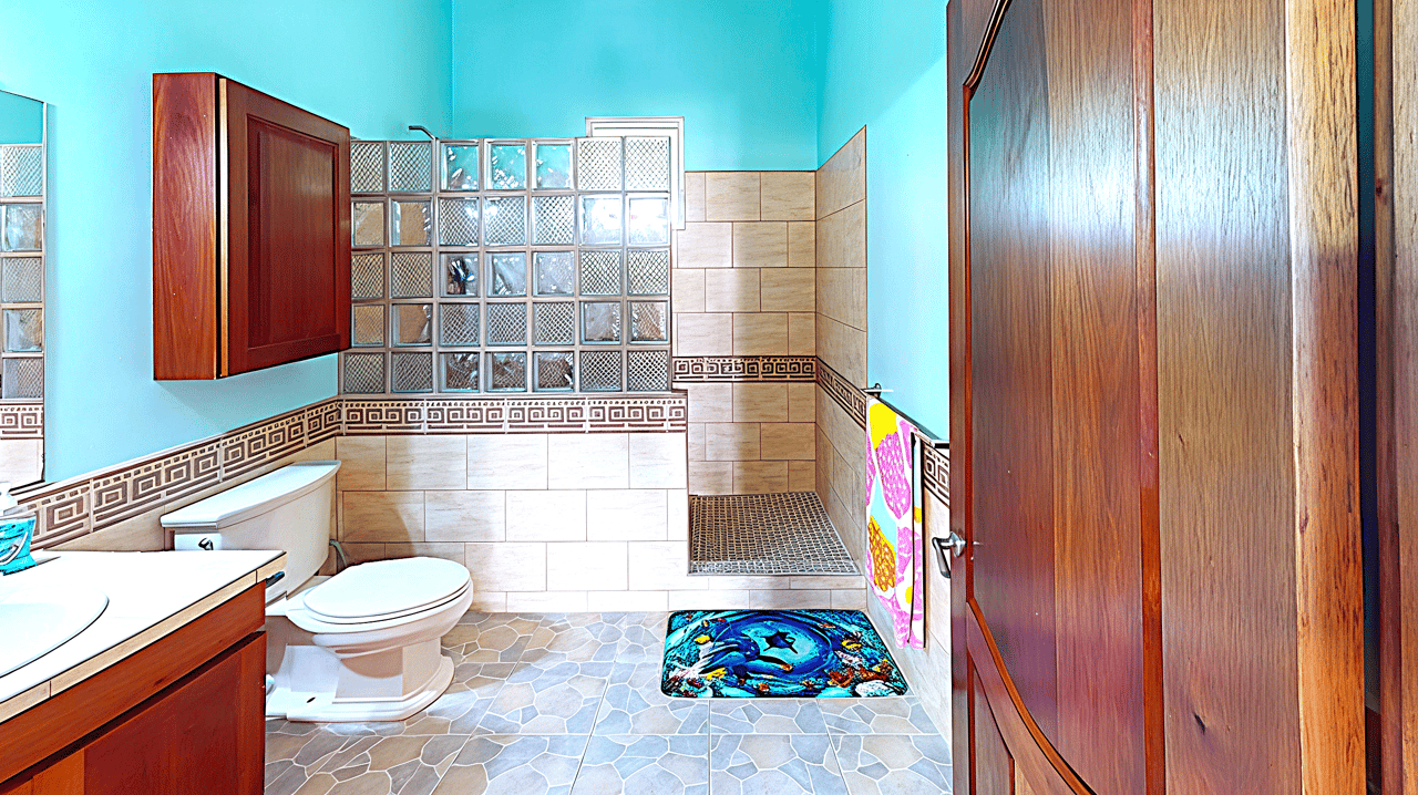 Waterview Villa steps away from 9 hole golf course and the Caribbean Sea