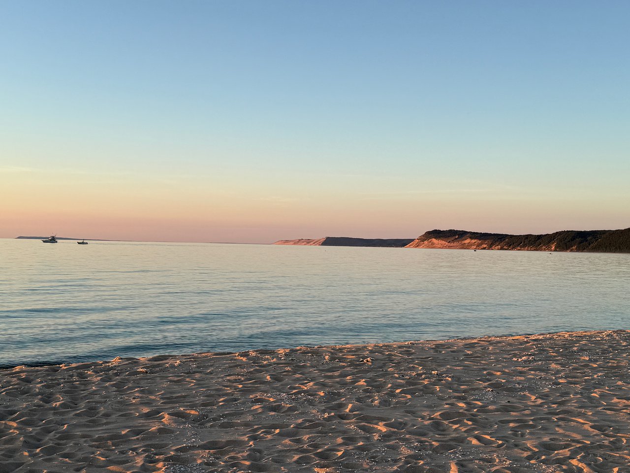 Lake Michigan beach in the light of the setting sun