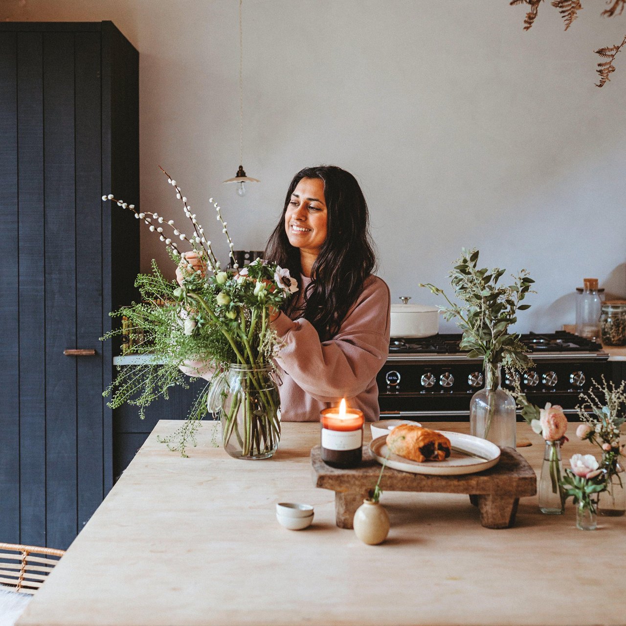 Bright modern kitchen with fresh flowers creating a clean and inviting atmosphere
