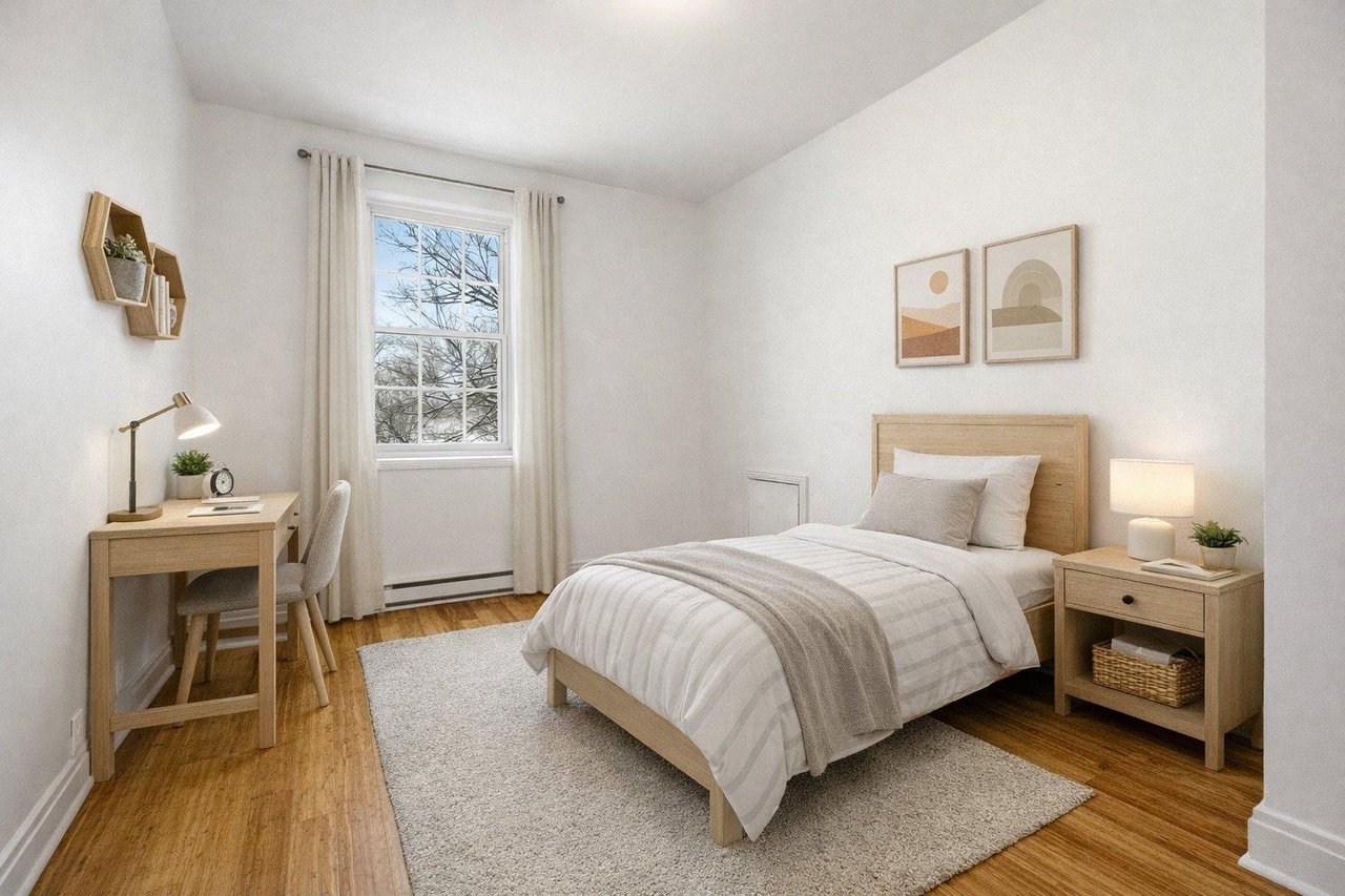 At the edge of Westmount | Corner unit with a view of Mount Royal