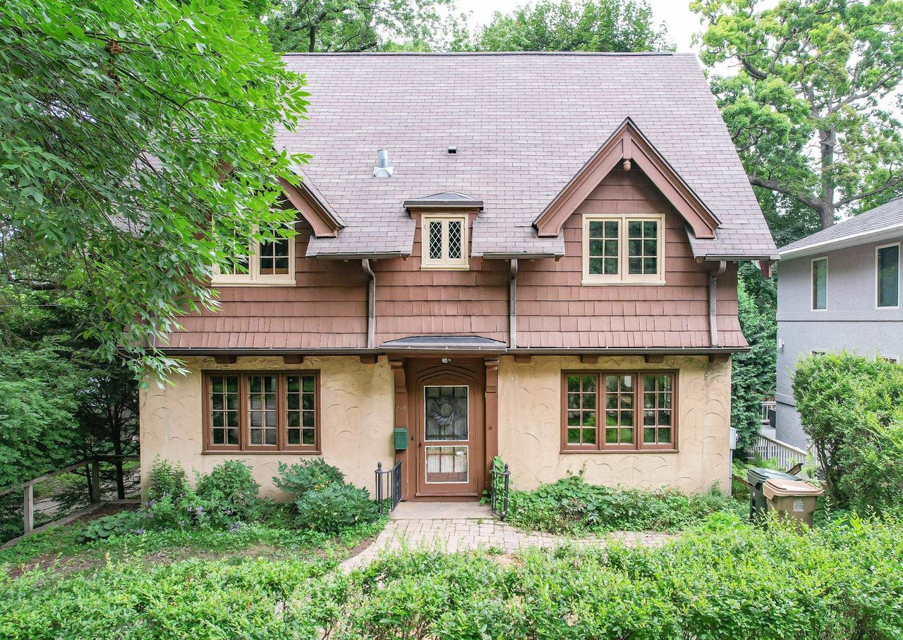 A characterful older stucco and shingle home in Madison, the kind of long-owned house featured in this guide to what has changed about selling.