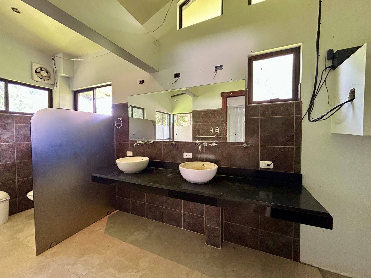Fixer-Upper Home with an studio Office in Palmar Norte on a 4-Hectare Property