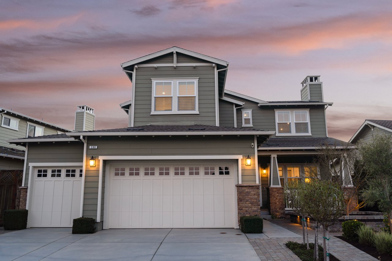 Craftsman-style home exterior with welcoming front porch and landscaped yard