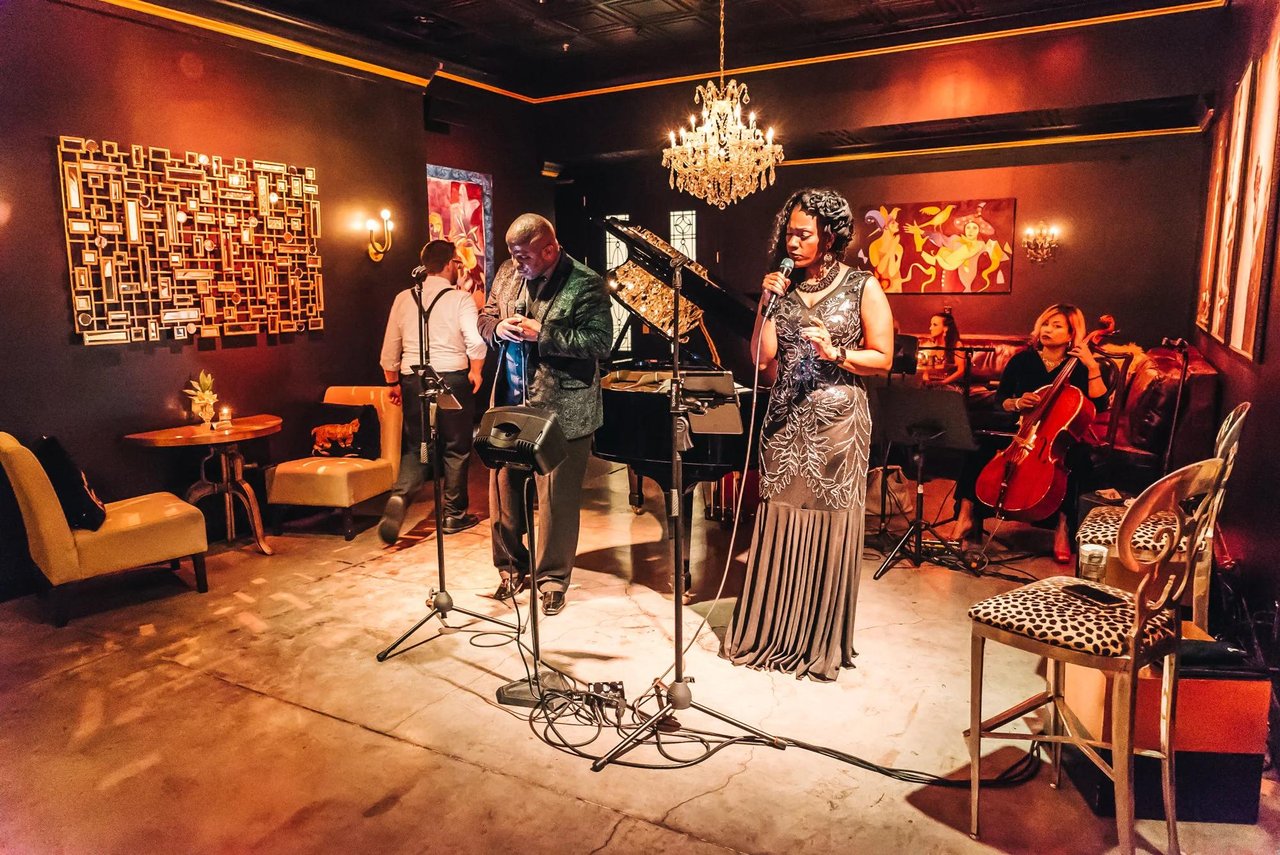 Lively Tampa restaurant atmosphere with cocktails, dinner, and evening entertainment.