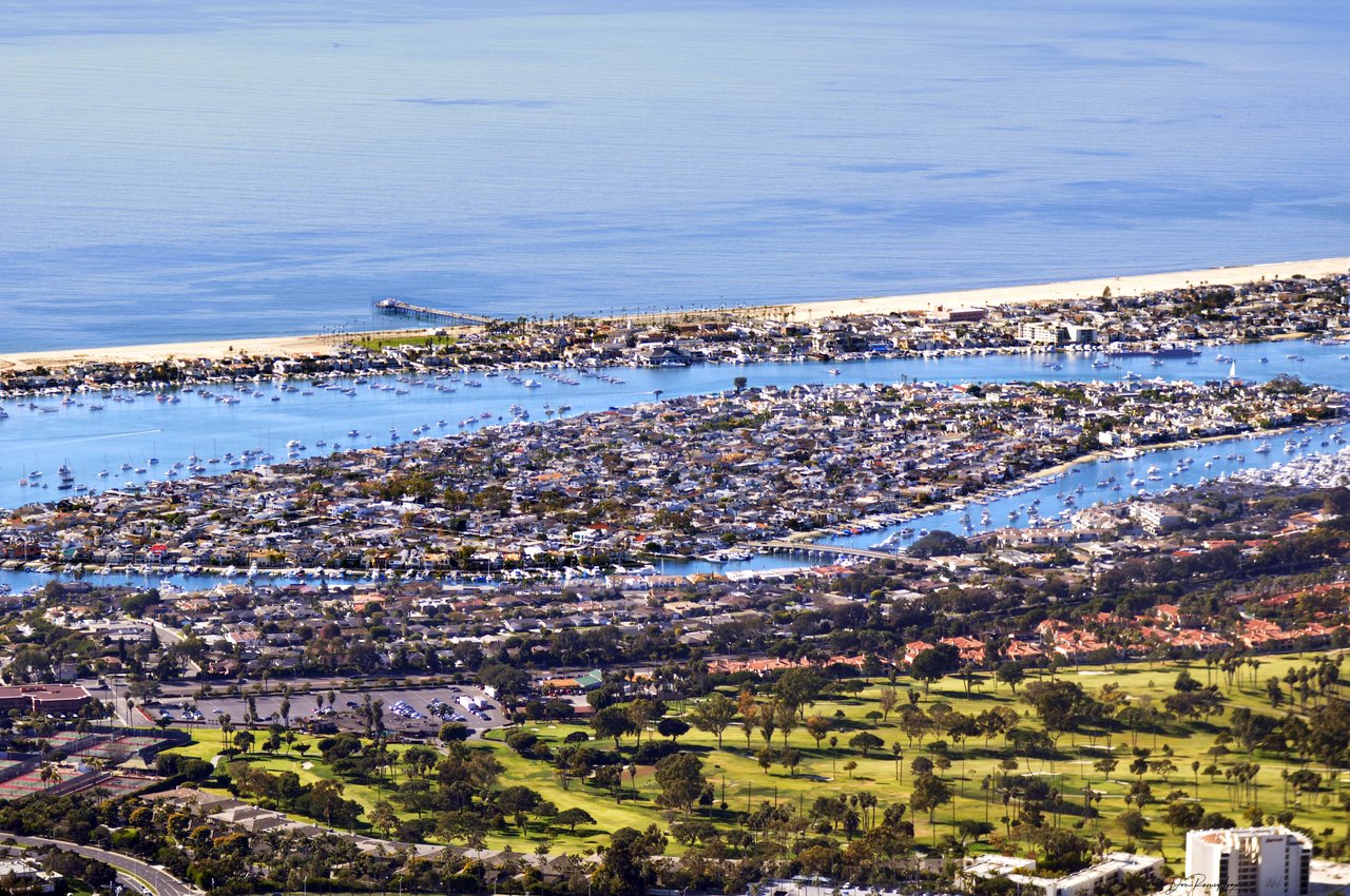 Discover Balboa Island Newport Beach homes for sale with Harrison White, a local real estate agent specializing in luxury coastal properties.