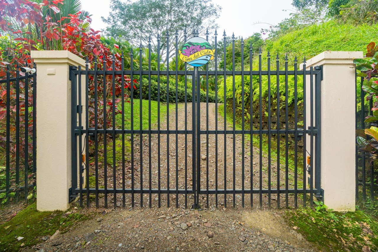 Ocean, jungle & mountain views on a meticulously landscaped 3-home family compound