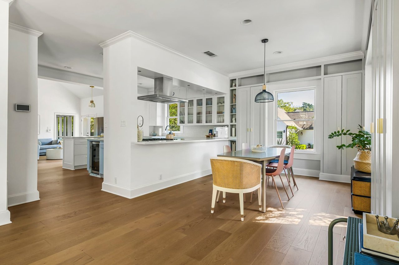 Open-concept kitchen and dining area at 1500 Northwood Rd, Pemberton Heights, Austin. Renovation by McWalters Collaborative.