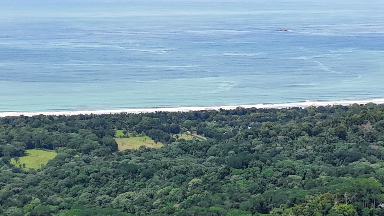 Large Uvita Lot With Whale’s Tail Ocean Views, Sunsets & Legal Water – Ready to Build!