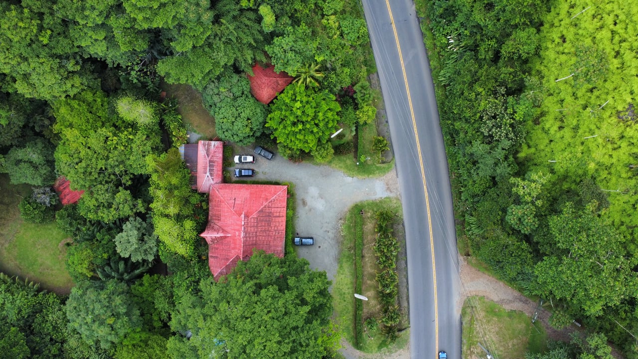 10-Acre Uvita Commercial Property with Existing Hotel & Highway Frontage – Development Potential Near the Beach