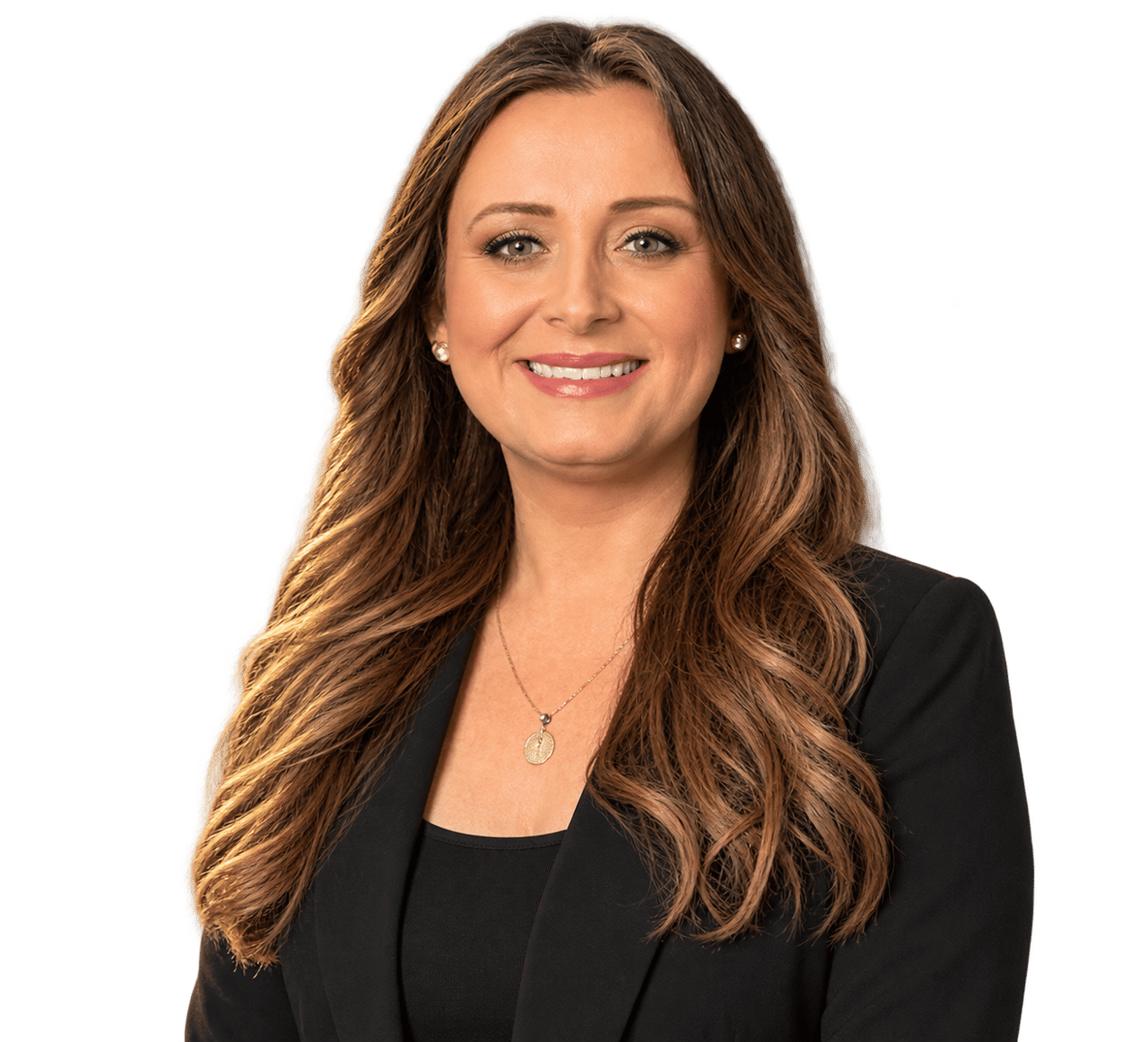 Crystal Davis, smiling realtor with long brown hair, wearing a black blazer and pendant necklace.