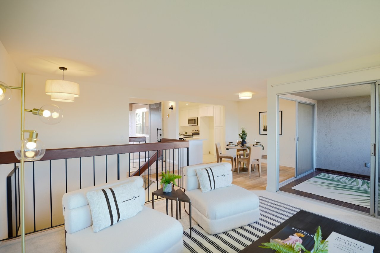 Open Living and Dining Area with Balcony – Renovated Townhome at 6321 Caminito Luisito, San Diego CA 92111
