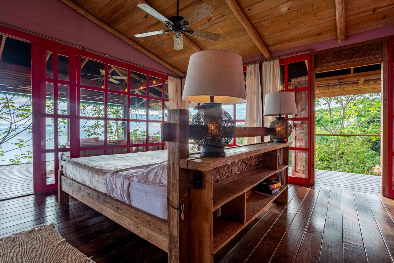 A Handcrafted Residence Immersed in Nature Above the Canopy Ocean View Architectural Home