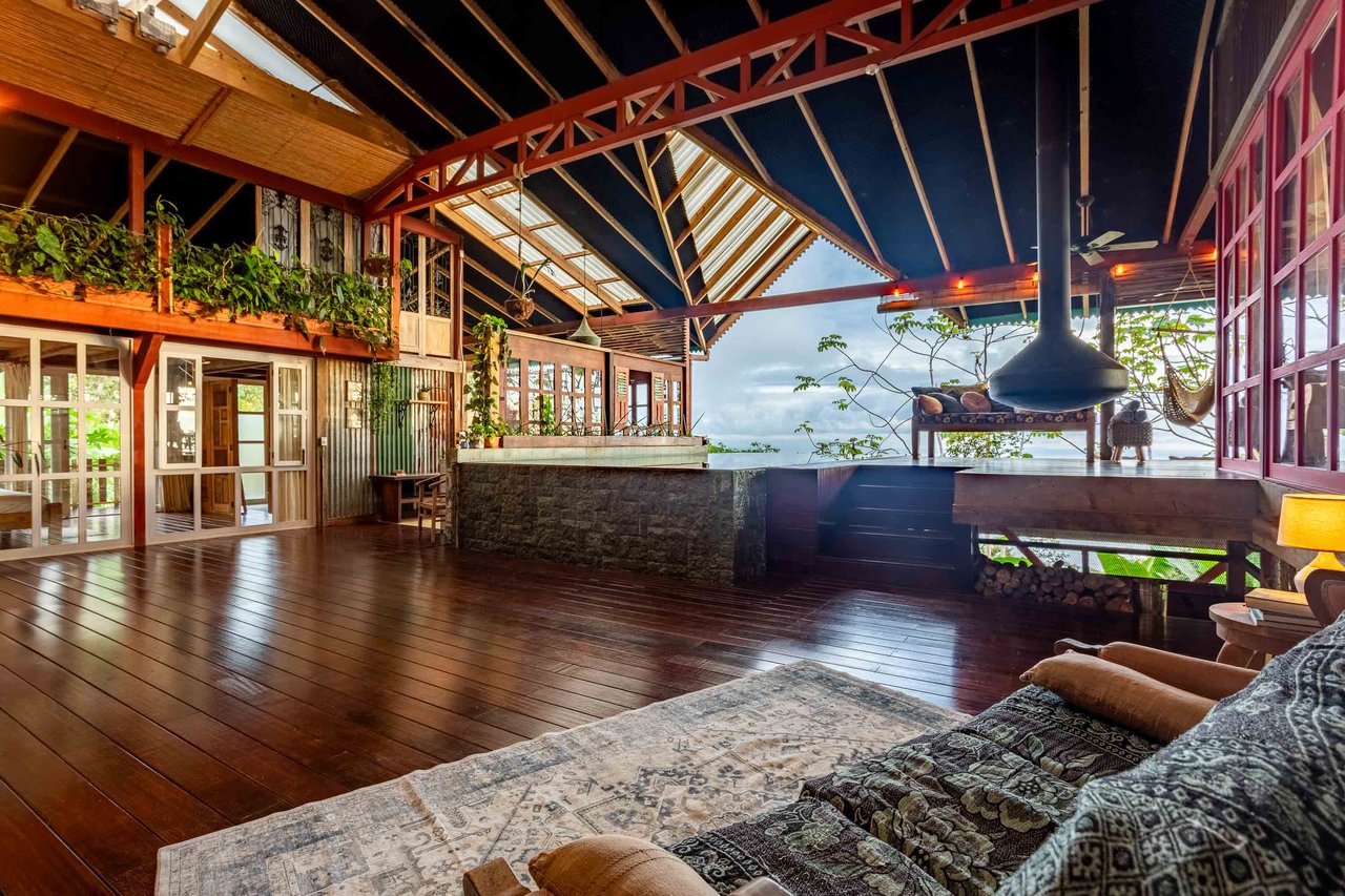 A Handcrafted Residence Immersed in Nature Above the Canopy Ocean View Architectural Home