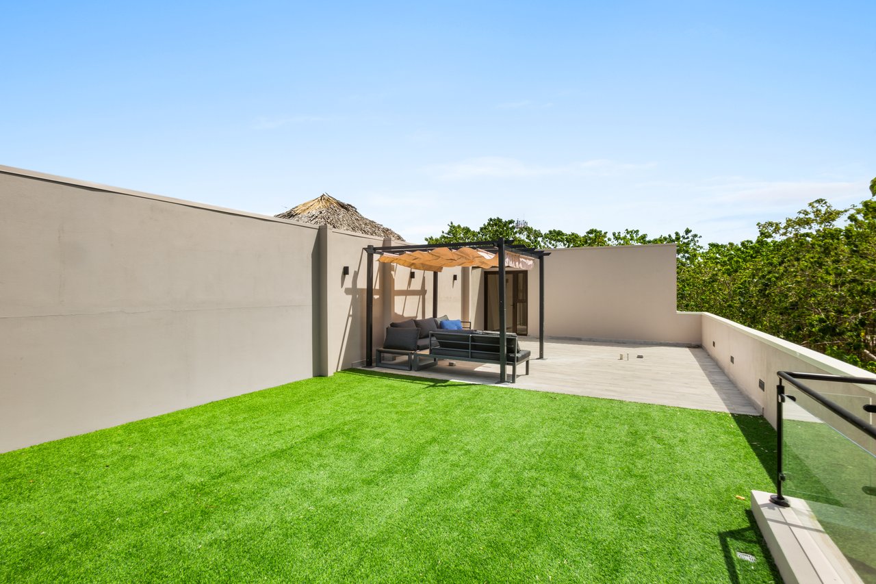 Flamingo Estates Luxury Home | Modern 4-Bed Retreat with Pool & Rooftop Terrace Near Beach & Marina