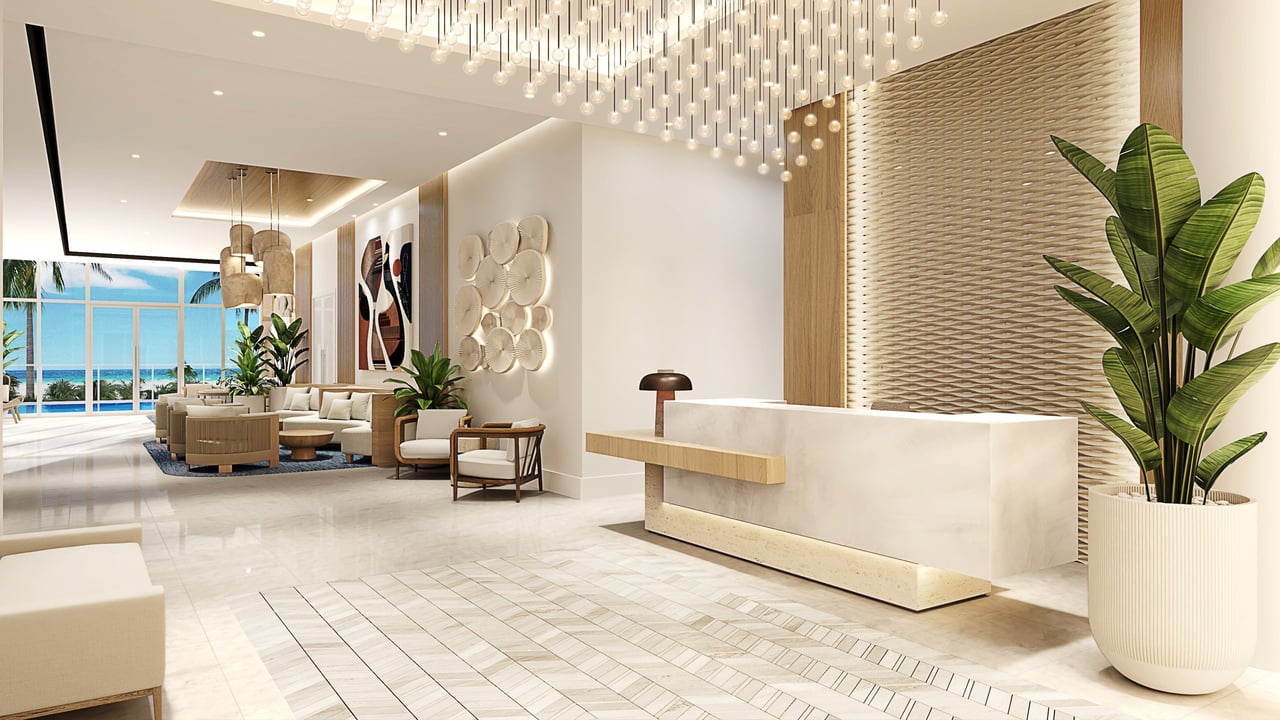 Ocean 580 lobby reception rendering with warm finishes and ocean views.