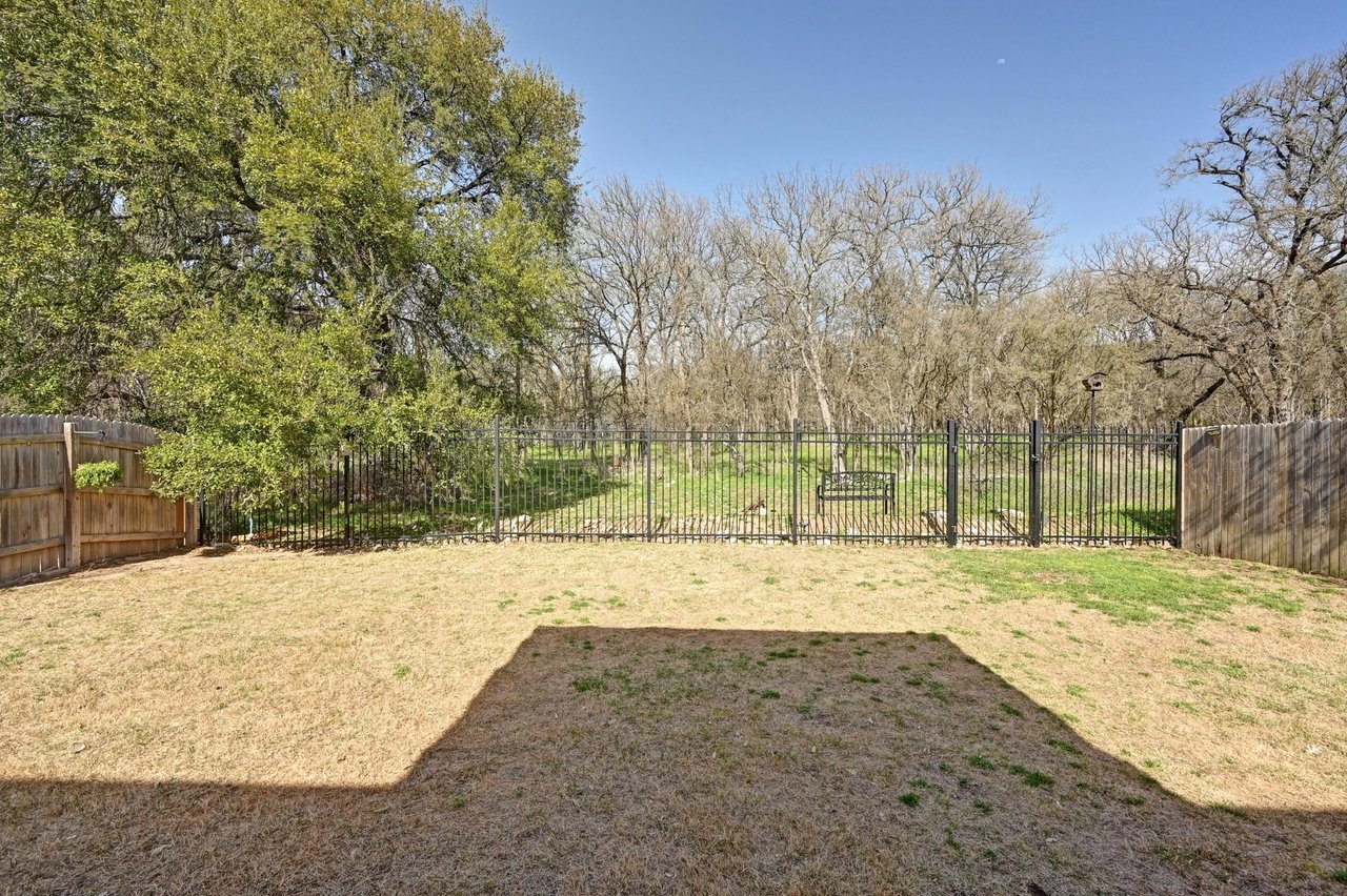 Exceptionally rare and meticulously cared-for home, nestled against the breathtaking backdrop of McKinney Falls State Park!