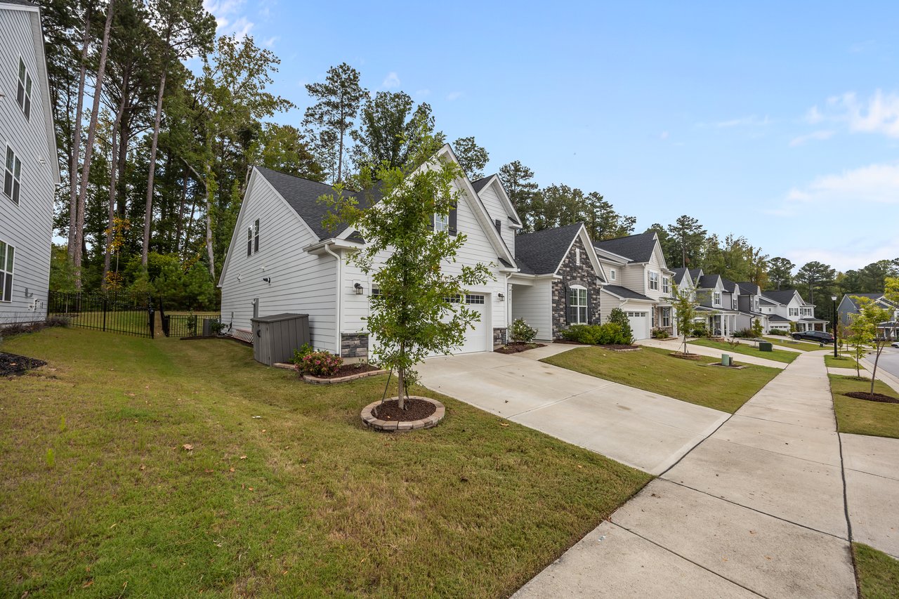 Residential neighborhood homes in the Raleigh area representing everyday living costs beyond the home purchase price